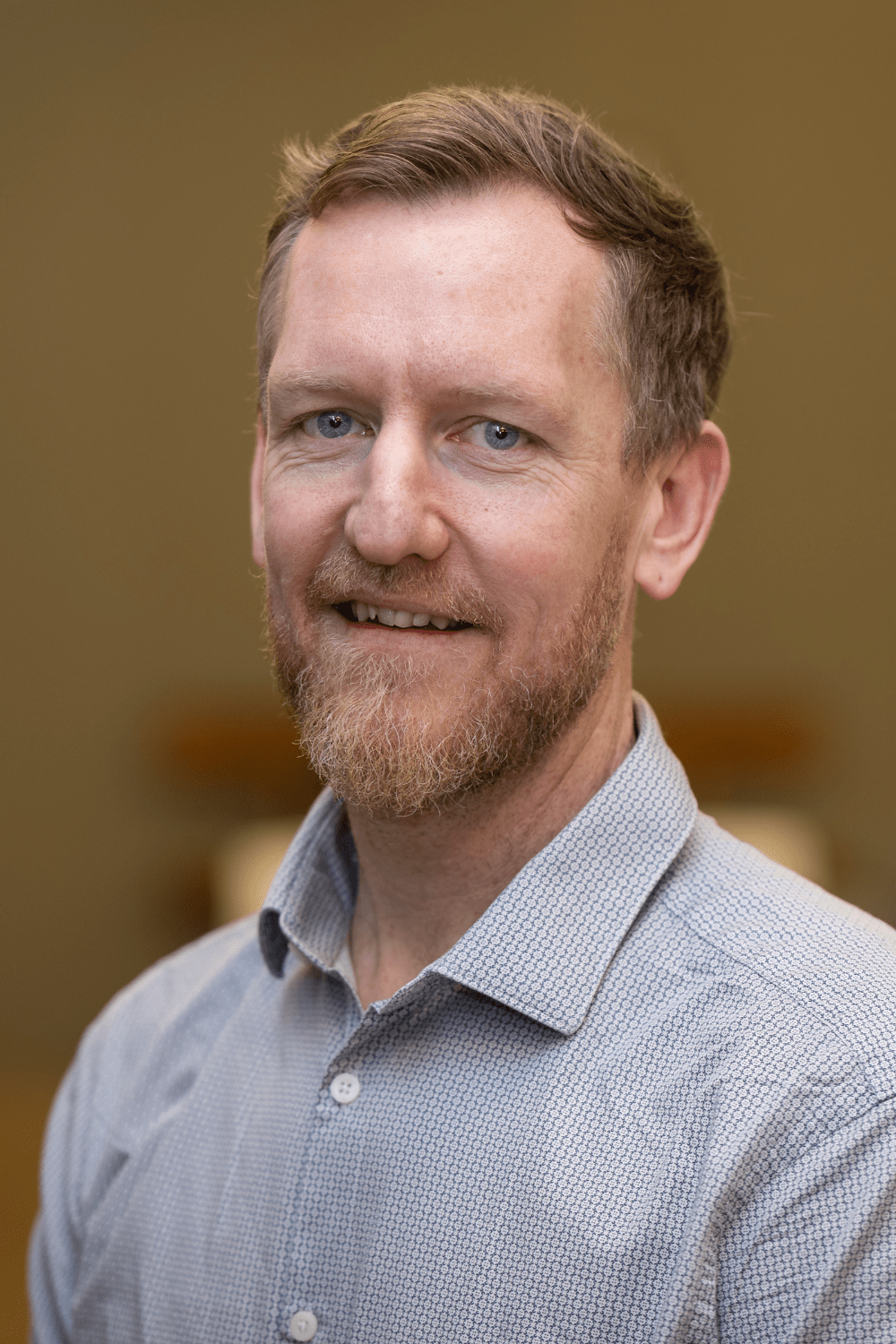 Amir Rizwan: Man with beard and glasses.