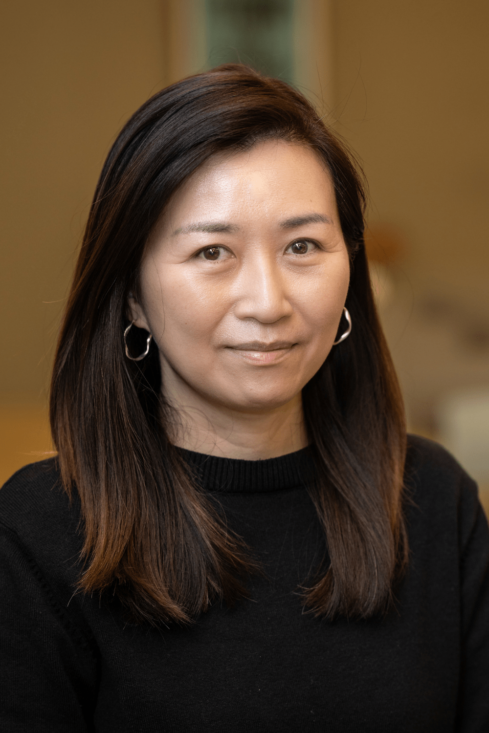 Amir Rizwan: Man with beard and glasses.